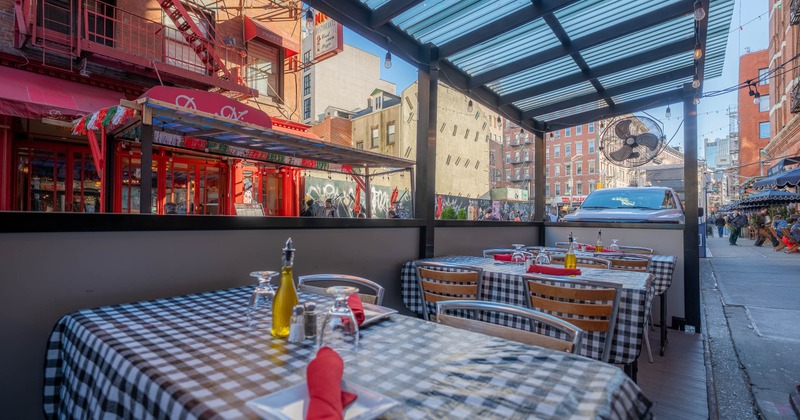 Patio, tables and chairs set for guests