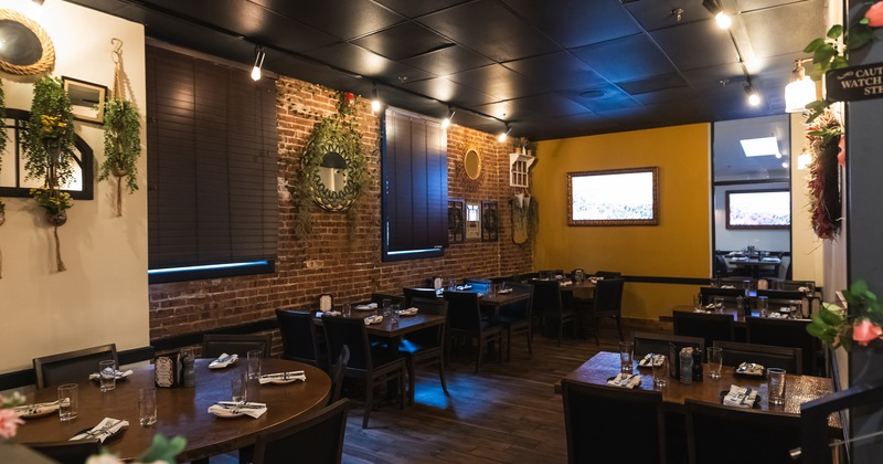 Modern and cozy interior dining area with set tables ready for guests