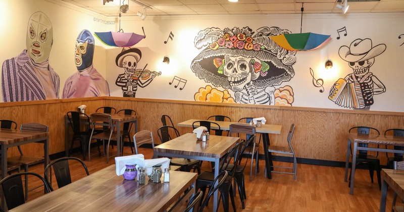 Interior, tables and chairs ready for guests