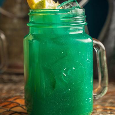 Green cocktail drink.
