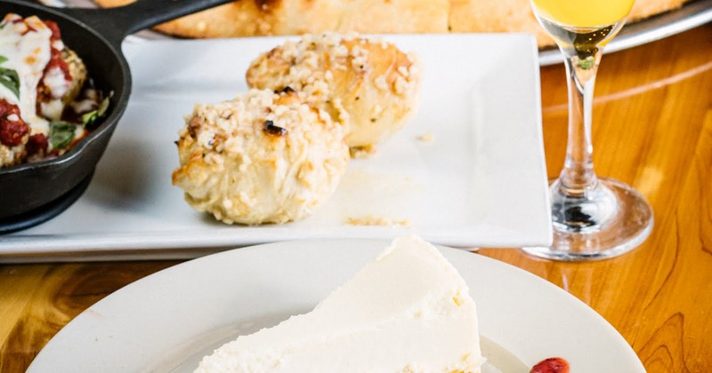 Cheese cake slice and a glass of orange juice