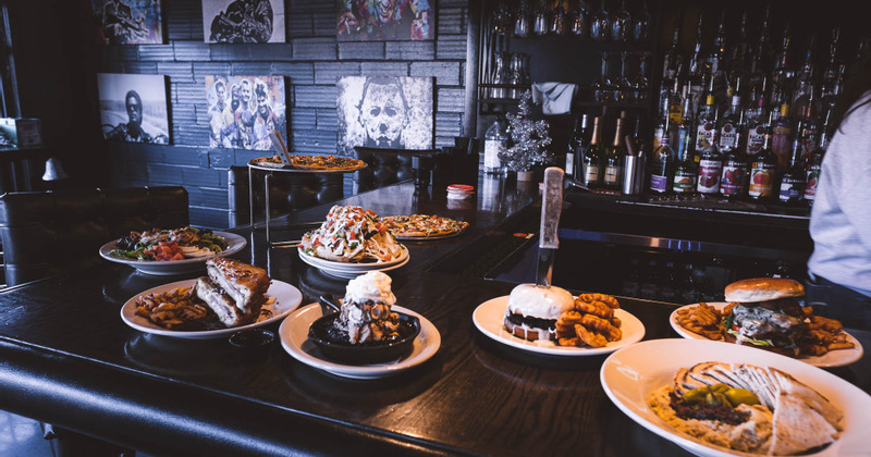 Different dishes served on table