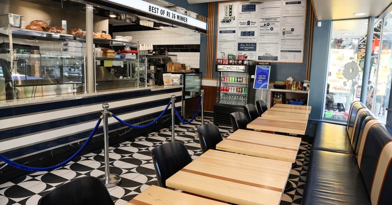 Interior, tables, chairs and long seating bench