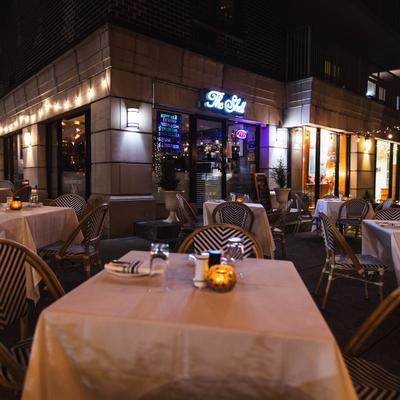Set outdoor dining area at night.