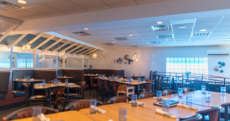 Dining room, tables set with tableware
