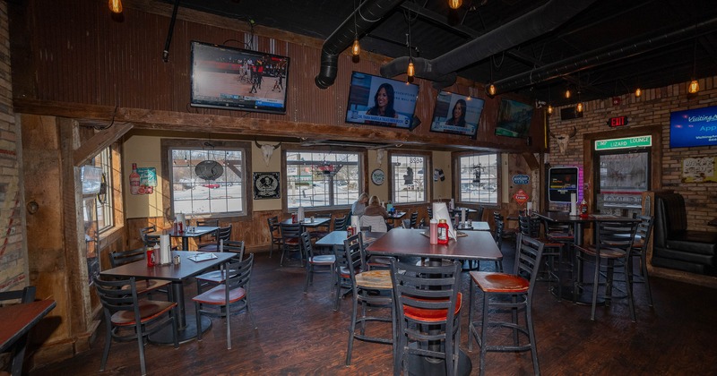 Interior, tables and chairs in dining area