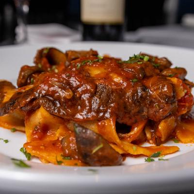 Homemade pappardelle ground beef ragu.