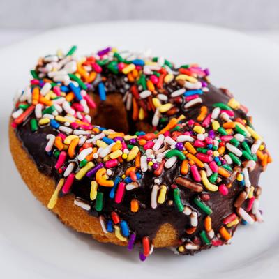 Plain chocolate frosted with sprinkles.