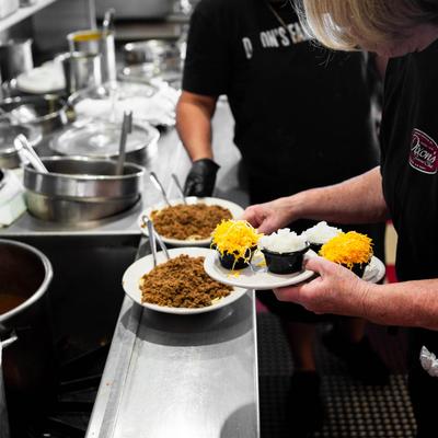 Kitchen staff preparing food.