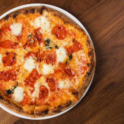 Margherita pizza, with spicy salami, cheese and basil