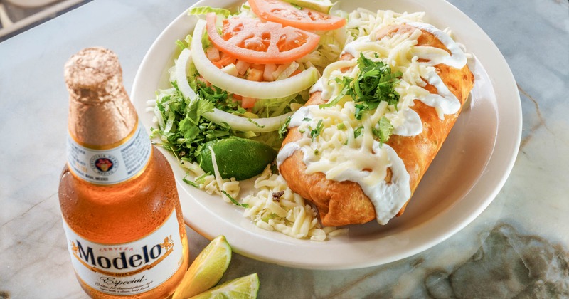Chimichanga with salad and Mexican beer
