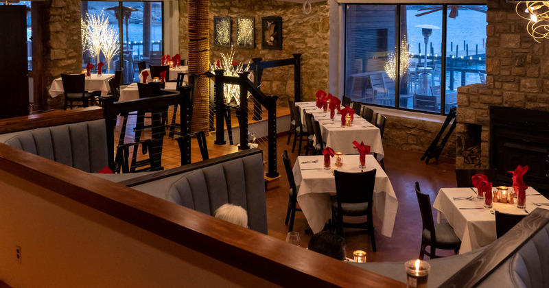 Interior, dining tables ready for guests