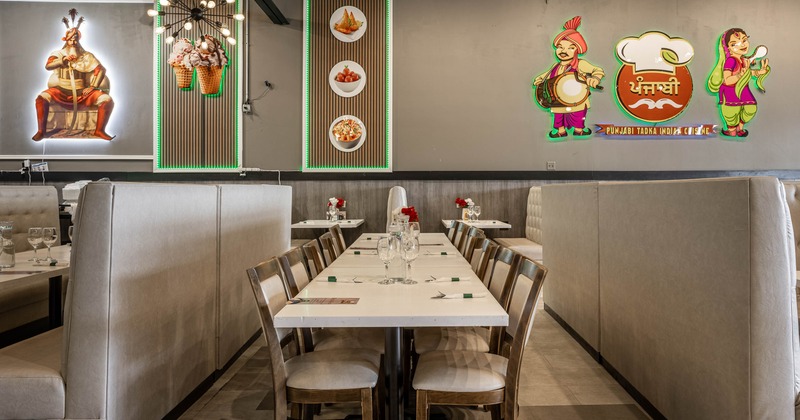 Inside, seating area, table ready for guests