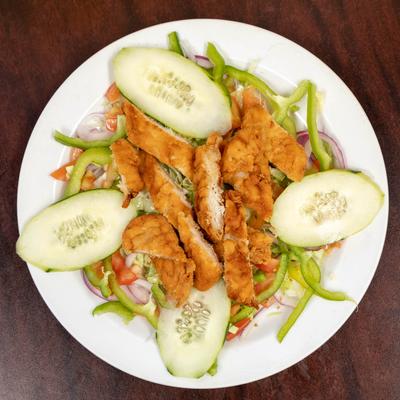 Crispy chicken tenders, with lettuce, tomato, onion, bell peppers, cucumber, and cheese.