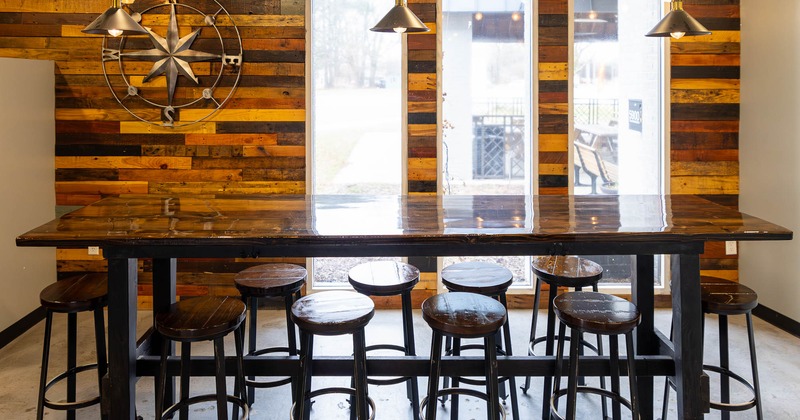 Large table with bar stools.