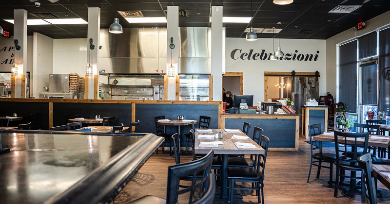 Interior, pizza order counter and tables for dining