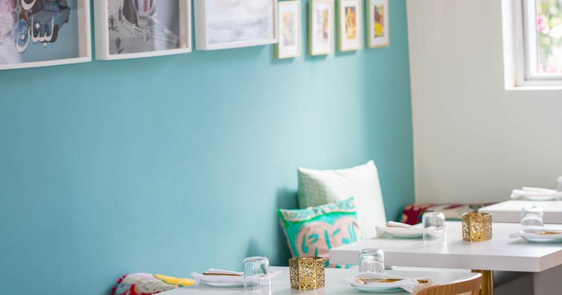 Interior, tables with tableware and decoration