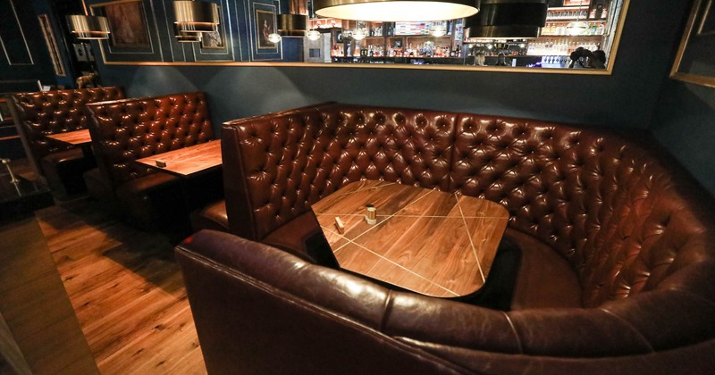 Interior, bar area, booth seating and tables