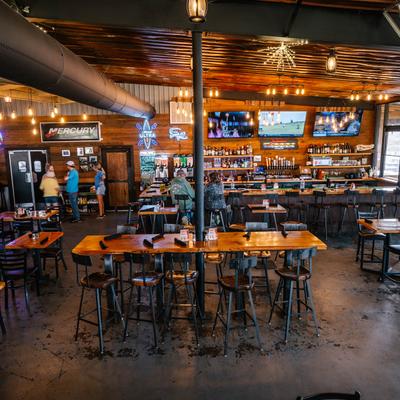 Interior, tables and seating, a bar.