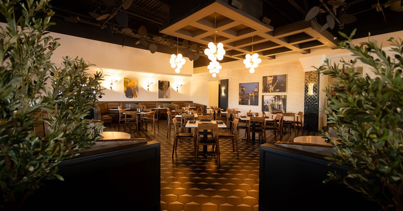 View of a dining area, tables and chairs
