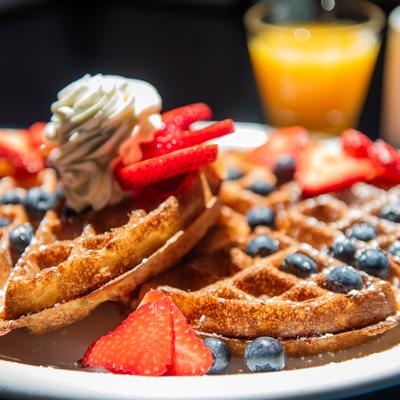 Waffles topped with berries.