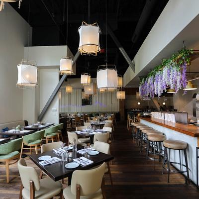 Dining area with tables set for dining.