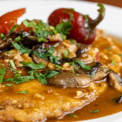 Breaded chicken sauteed with mushrooms, butter, white wine, garlic, and cherry peppers.