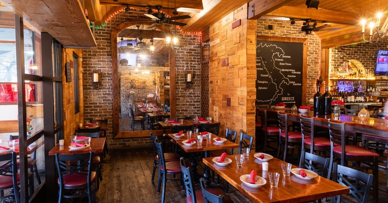 Interior, dining area, bar, wooden top bar, tables for two and four, wooden flooring