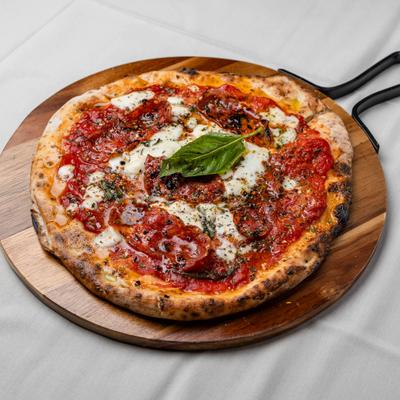 Served Diavola pizza.