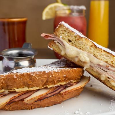 Monte Cristo sandwich served with cranberry sauce.