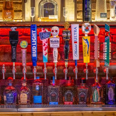 Draft beer taps with labels, front view.