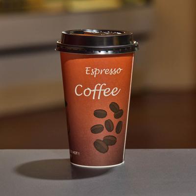 Espresso coffee in a to-go cup.