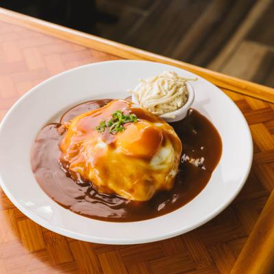 Loco moco plate with beef patty, fried egg, and brown gravy.