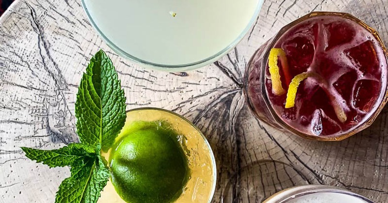 Assortment of cocktail drinks, overhead view