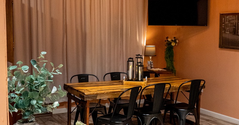 Wooden table for six guests in the corner