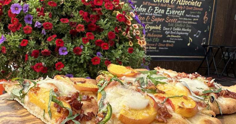 Food and a flower arrangement on a table