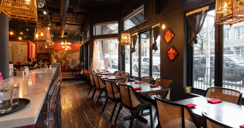 Interior, tables and chairs near window