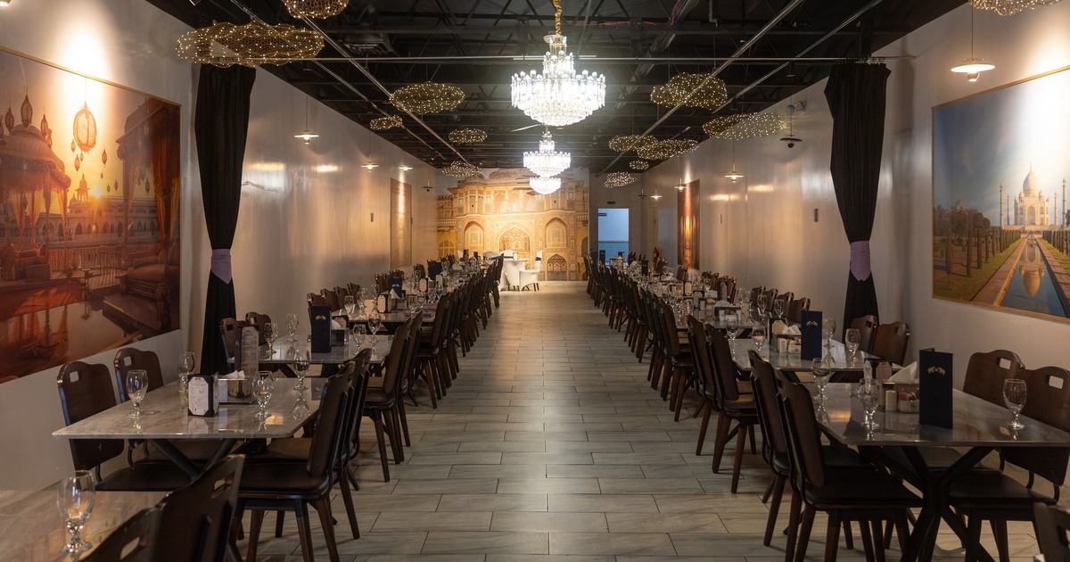 Interior, large dining area with painting on the wall