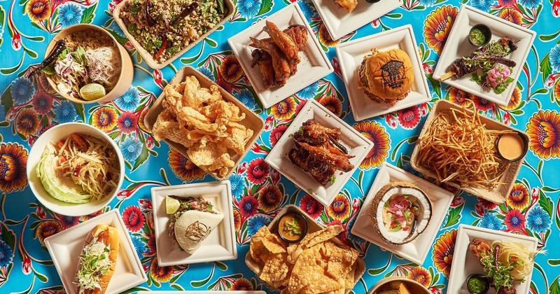 Assorted  dishes displayed on a colorful tablecloth