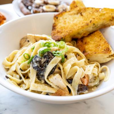 Served chicken alfredo pasta