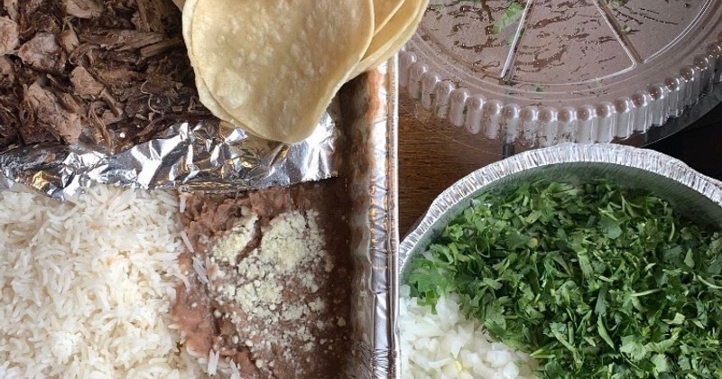A top view of prepared food in containers
