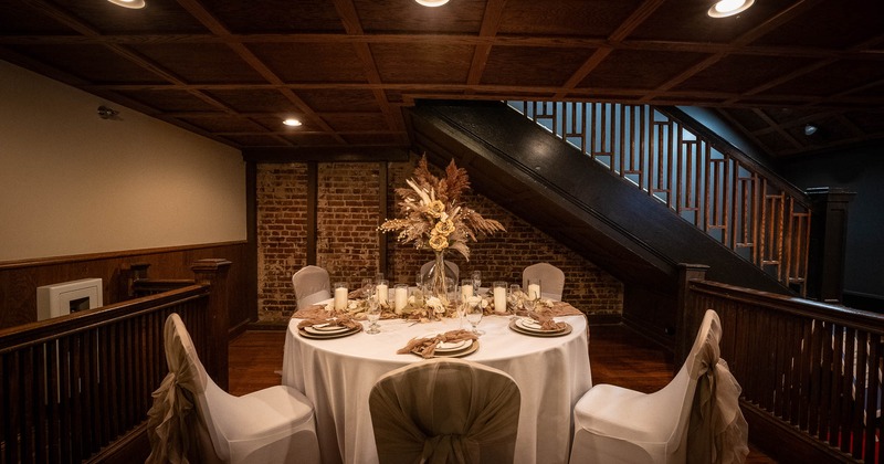 Interior, table set for guests