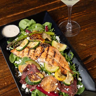 Beet Salad with chicken, arugula and asparagus, side view.