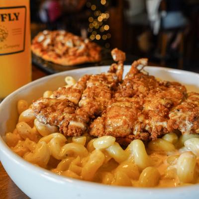 Hometown hero macaroni topped with crispy chicken.