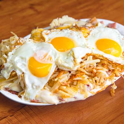 Breakfast Skillet with hushbrowns and fried eggs.
