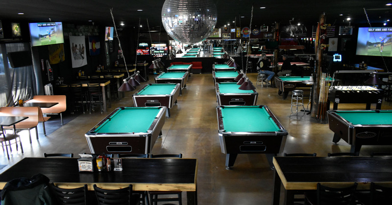 Interior, pool tables lined up