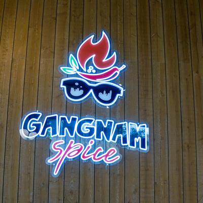 Neon sign of the Gangnam Spice logo.