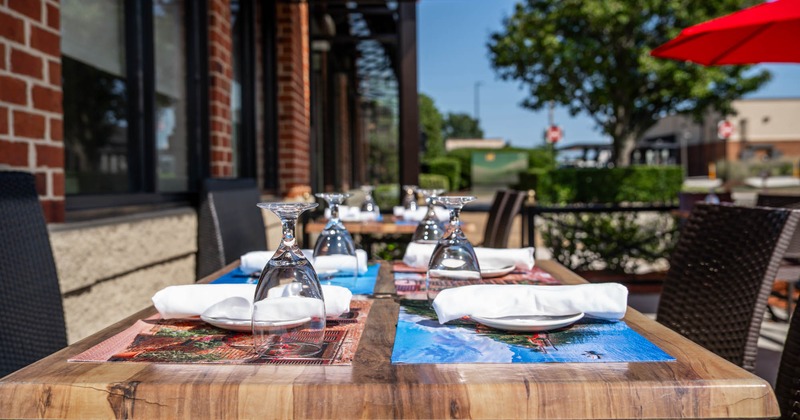 Exterior, tables ready for guests, closeup