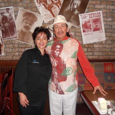 Owner with Carlos Santana.