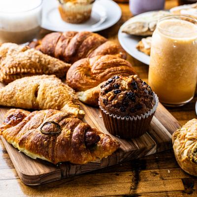 A variety of baked goods and drinks.